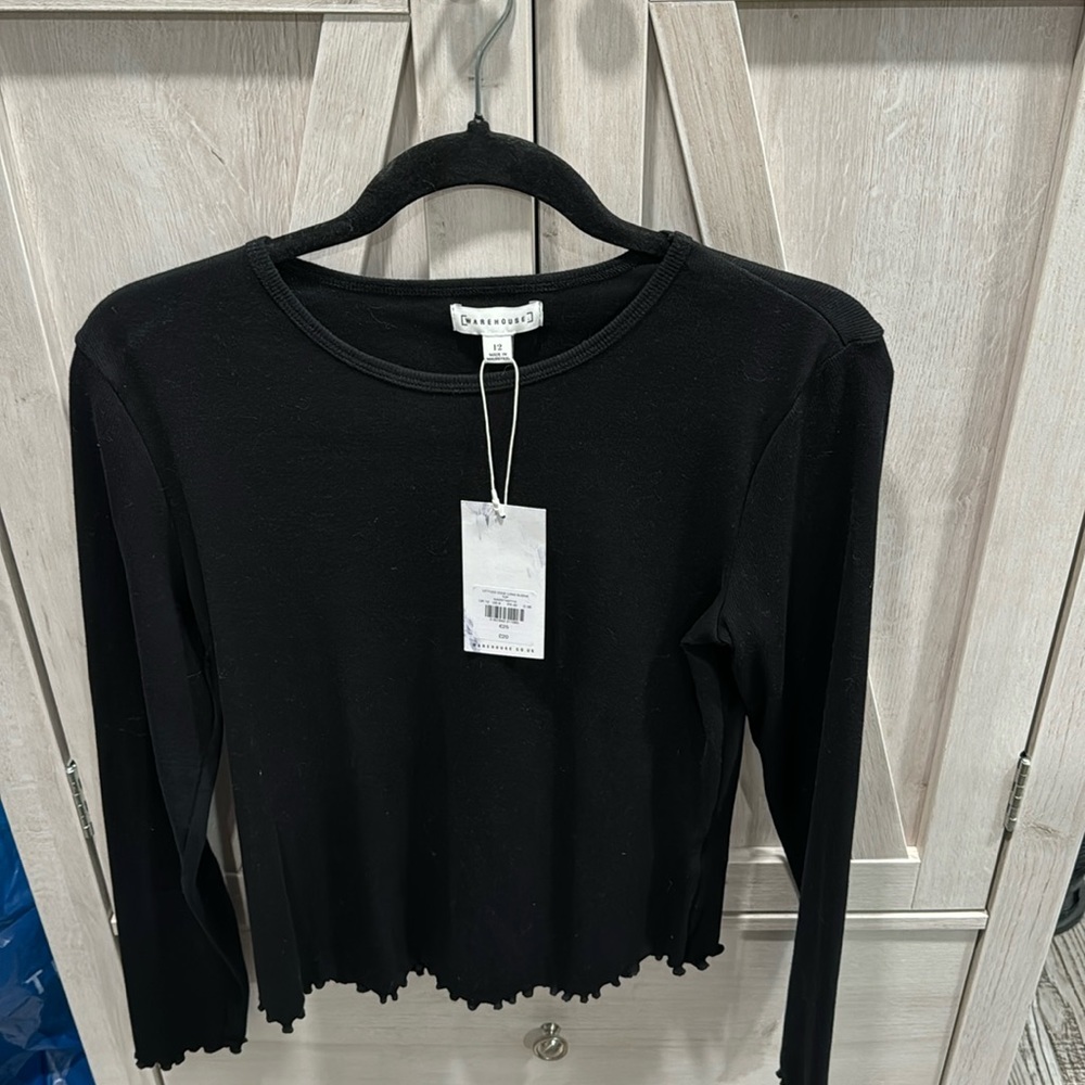 Warehouse brand Black lettuce trim top Size 12